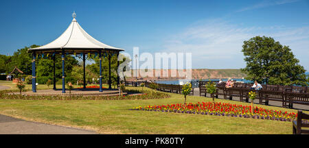 UK, England, Yorkshire, Filey, Crescent Garden, bandstand and floral planting, panoramic Stock Photo