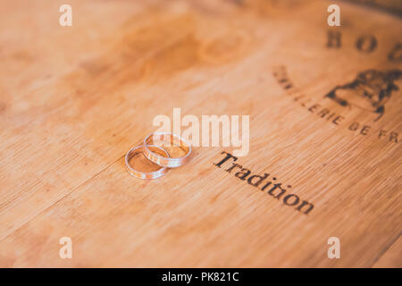 Wedding Rings and Tradition Engraved on Wooden Wine Barrel Stock Photo