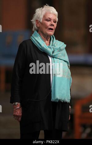Dame Judi Dench performs from Shakespeare's Antony and Cleopatra during a service of thanksgiving to celebrate the life and work of Sir Peter Hall, the former director of the National Theatre, at Westminster Abbey in London. Stock Photo