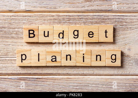 Budget planing word written on wood block. Budget planing text on table, concept. Stock Photo