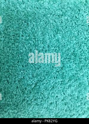 Aqua carpet closeup showing textures, background. Stock Photo