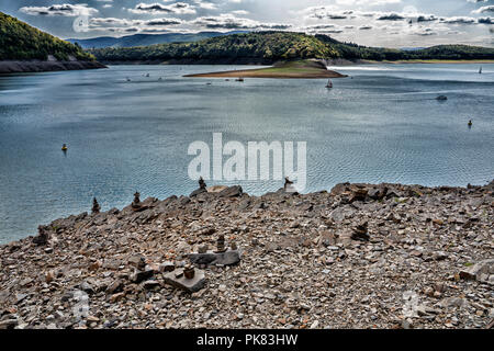 Cairns, erected at Lake Edersee at low tide, Hesse, Germany, Europe Stock Photo