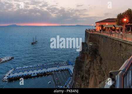 The restaurant in the evening on a cliff overlooking the bay. Sant Agnello. Italy. Stock Photo