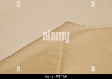 Silk fabric, beige organza. Stock Photo