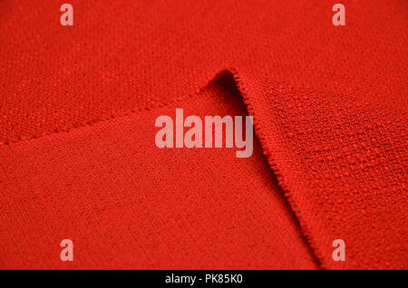 Jacquard, a cloth of red color Stock Photo