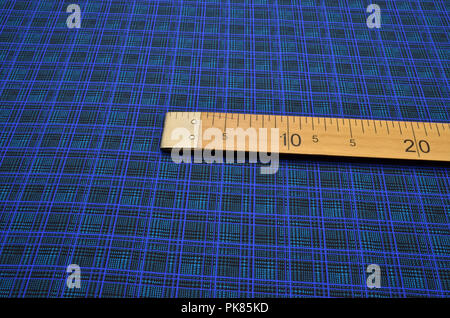 Silk fabric, satin, black-turquoise-blue cage Stock Photo