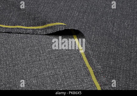 Fabric suit, tweed dark gray of cashmere and wool. Stock Photo