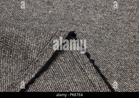 Suit fabric, tweed black and white from wool. Stock Photo