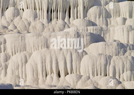 Travertine rock formations from calcium deposits Stock Photo