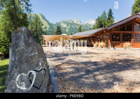 Hand Painted Hearts on Natural Rock Symbol of Wedding Union Stock Photo