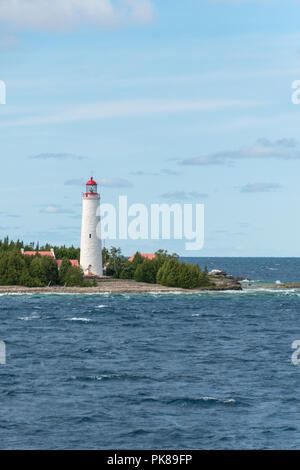 Cove Island Lighthouse Tobermory, Bruce Peninsula Landscape along lake shore Stock Photo