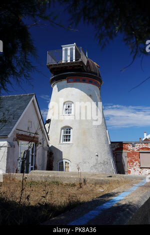 A redundant windmill which has been converted into a house on a street in Aldeburgh, Suffolk, UK Stock Photo