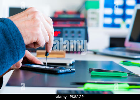 Fix and repair cell phone PCB Stock Photo