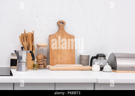 various wooden kitchenware on table at kitchen Stock Photo