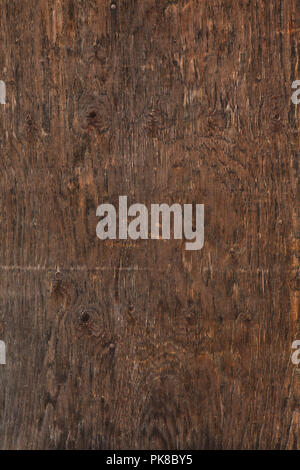 Old abandoned plywood. Background texture. Stock Photo