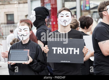 “Cube of Truth”. They are members of Anonymous for the Voiceless, or ...