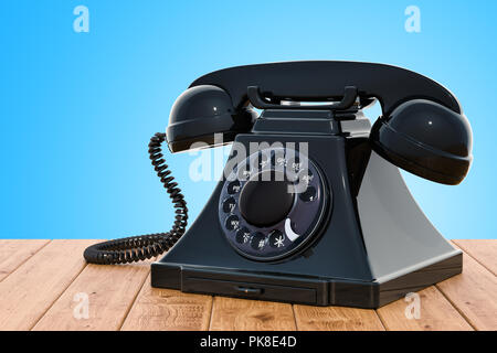 Retro telephone on the wooden table, 3D rendering Stock Photo