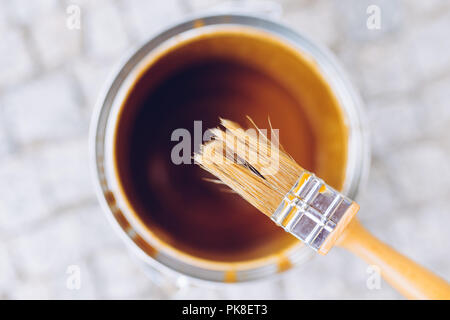 Paint brush on the can. Top view. House renovation, home improvement concept Stock Photo