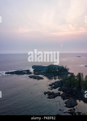 Aerial seascape view of Pacific Ocean Coast during a cloudy summer sunset. Taken in Ucluelet, Vancouver Island, BC, Canada. Stock Photo