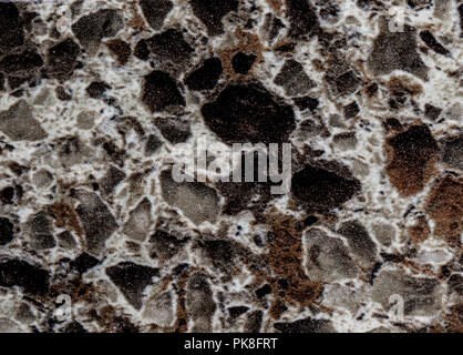 Brown rock surface. Random granite surface patter background. Stock Photo