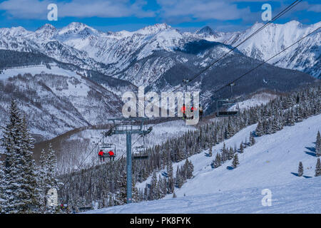 Wildwood Epress Lift 3 with the Gore Range in the background, Hunky Dory ski trail, winter, Vail Ski Resort, Vail, Colorado. Stock Photo