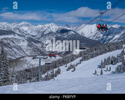 Wildwood Epress Lift 3 with the Gore Range in the background, Hunky Dory ski trail, winter, Vail Ski Resort, Vail, Colorado. Stock Photo