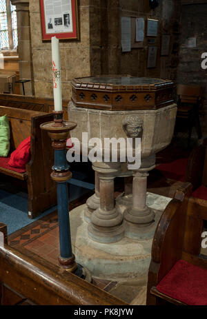 The font, Holy Trinity Church, Thrussington, Leicestershire, England, UK Stock Photo