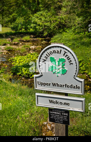 UK, Yorkshire, Wharfedale, Hubberholme, National Trust Upper Wharfedale sign beside Gray Gill Stock Photo