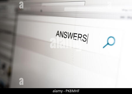 looking for answers concept with word answers in search bar of search engine Stock Photo