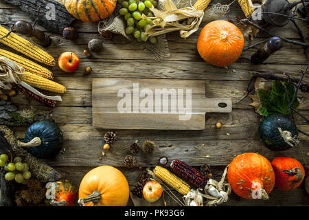 Thanksgiving dinner. Autumn fruit with plate and cutlery. Thanksgiving autumn background Stock Photo