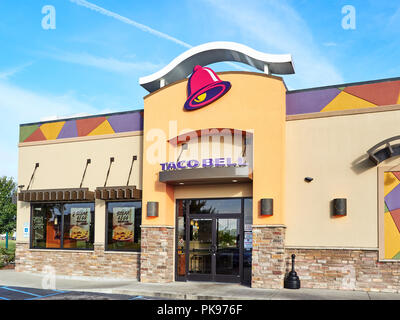 Exterior front entrance to fast food restaurant Taco Bell showing the corporate logo and current design in Montgomery, Alabama USA. Stock Photo