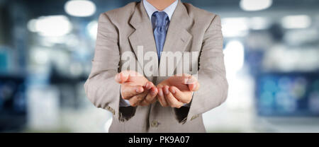 businessman workimg on VR blank wide touch screen computer on office blur background. Stock Photo