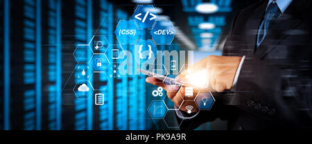 Coding software developer work with augmented reality dashboard computer icons of scrum agile development and code fork and versioning with responsive Stock Photo