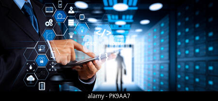 Coding software developer work with augmented reality dashboard computer icons of scrum agile development and code fork and versioning with responsive Stock Photo