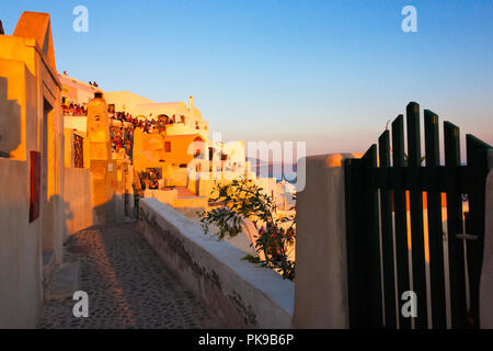 Houses on the coast of Aegean Sea, Oia, Santorini Island, Greece Stock Photo