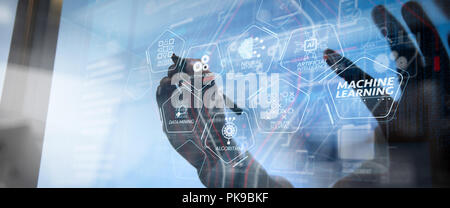 Machine learning technology diagram with artificial intelligence (AI),neural network,automation,data mining in VR screen.businessman hand working with Stock Photo