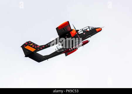 A German Luftwaffe North American Rockwell OV-10 Bronco, twin turboprop, with its commemorative poppy decoration. Stock Photo