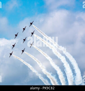 The Red Arrows Hawk jets in their 'Diamond Nine' formation Stock Photo