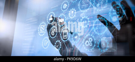 AR virtual screen dashboard with project management with icons of scheduling, budgeting, communication.businesswoman using tablet computer shows socia Stock Photo