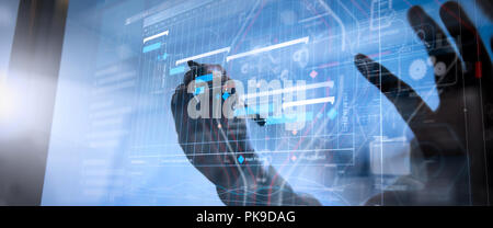 Project manager working and update tasks with milestones progress planning and Gantt chart scheduling virtual diagram.Businessman hand pressing an ima Stock Photo
