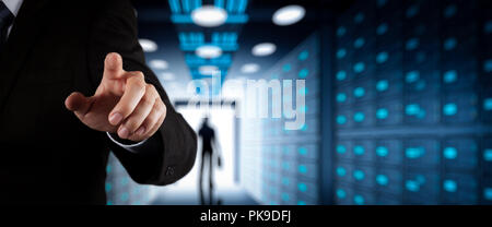Businessman working with VR wide blank screen computer on server room in background. Stock Photo