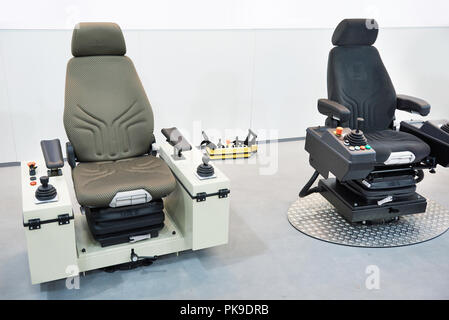Driver seats for construction machinery Stock Photo