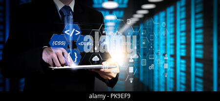 Coding software developer work with augmented reality dashboard computer icons of scrum agile development and code fork and versioning with responsive Stock Photo