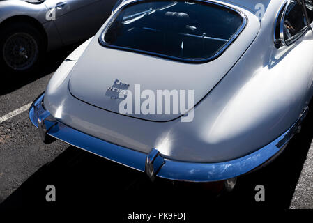 4.2 litre e type jaguar sports car fastback in silver at the chill in glen event at glen innes in northern new south wales, australia, rear view Stock Photo