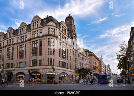 Stockholm, Sweden - Aug. 2, 2018: City sight, corner of Kungsgatan and Vasagatan at dusk on a summer day, Stockholm, Sweden. Stock Photo