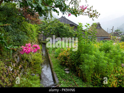 Thatched roofed houses in a traditional village, Kyoto Prefecture, Miyama, Japan Stock Photo