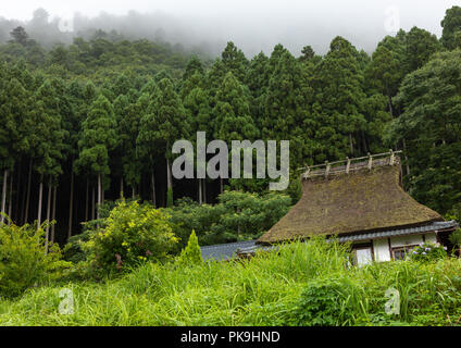 Thatched roofed house in a traditional village, Kyoto Prefecture, Miyama, Japan Stock Photo