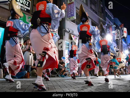 Japanese women dancing during the Koenji Awaodori dance summer street festival, Kanto region, Tokyo, Japan Stock Photo