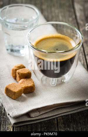 Cup of espresso coffee and sugar. Stock Photo