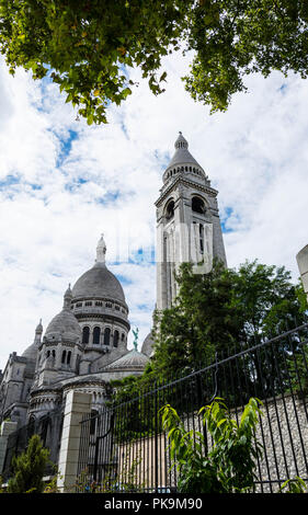 sacre-coeur limestone Cathedral montmarte , paris,france during sunnyday with green conopy Stock Photo